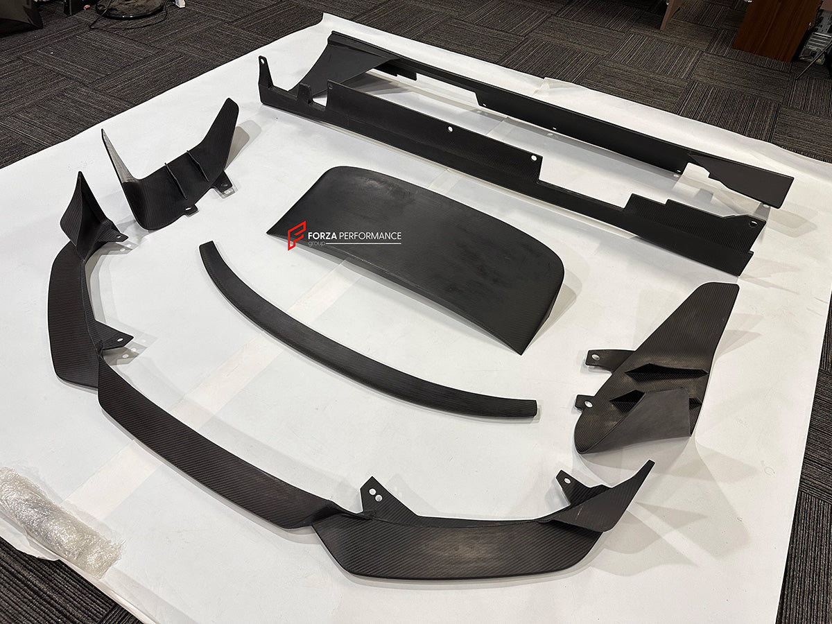 DRY CARBON BODY KIT for FERRARI FF 2011 - 2017

Set includes:

Front Lip
Side Skirts
Roof Spoiler
Rear Trunk Spoiler
Rear Diffuser Add-Ons

Material: Dry Carbon