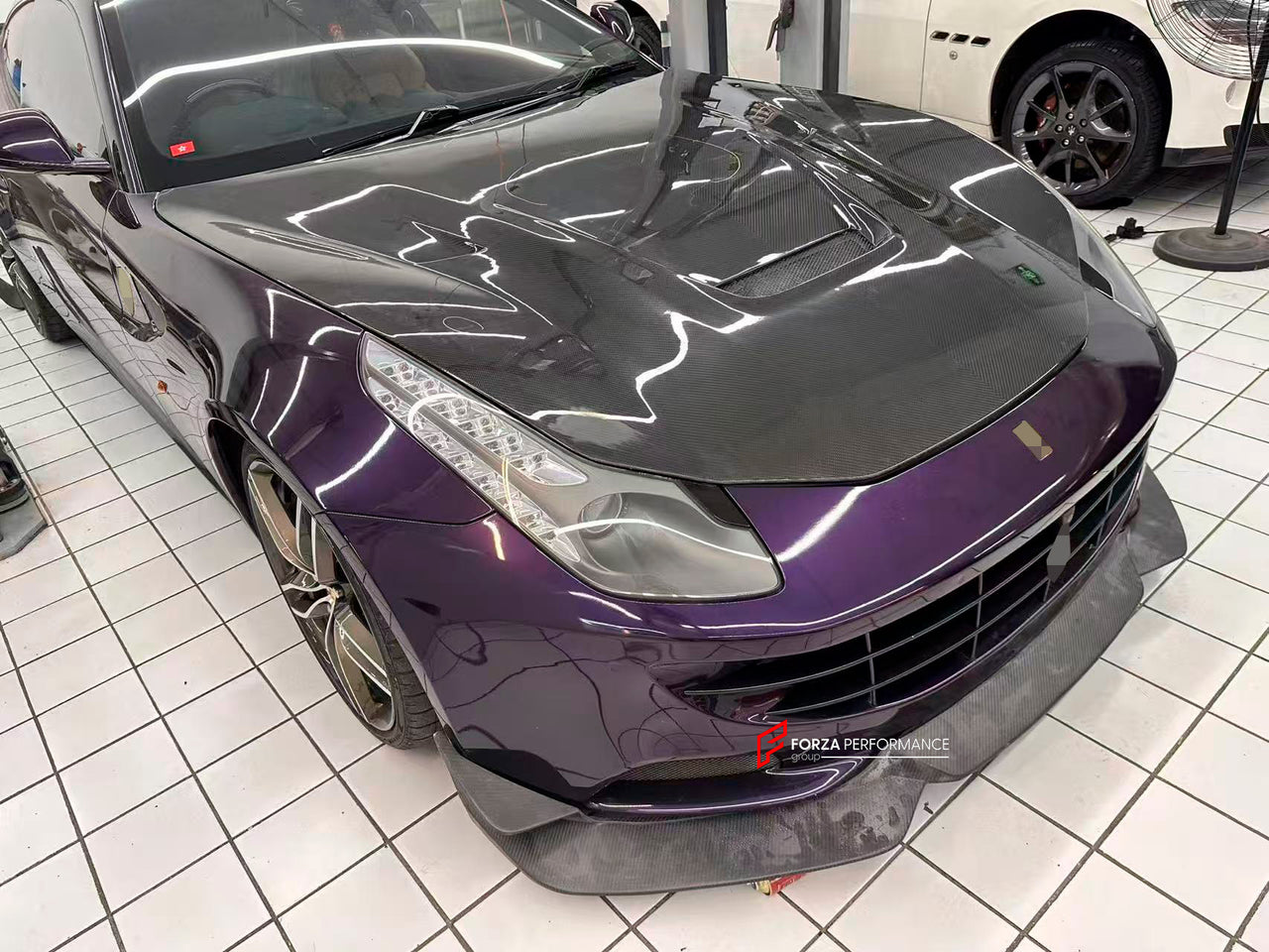 DRY CARBON BODY KIT for FERRARI FF 2011 - 2017

Set includes:

Front Lip
Side Skirts
Roof Spoiler
Rear Trunk Spoiler
Rear Diffuser Add-Ons

Material: Dry Carbon