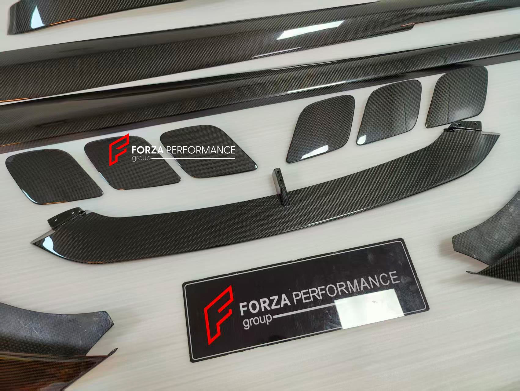 DRY CARBON BODY KIT for FERRARI GTC4 LUSSO 2016 - 2020

Set includes:

Front Lip
Front Strut
Front Fenders Air Vent Trims
Side Skirts
Roof Spoiler
Rear Spoiler
Rear Diffuser Add-Ons

Material: Dry Carbon Fiber

NOTE: Professional installation is required.

Contact us for pricing