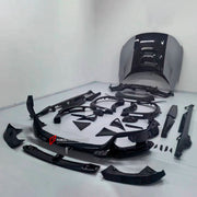 DRY CARBON BODY KIT for FERRARI PUROSANGUE 2023+ FORZA PERFORMANCE custom fit Novitec Style
Set includes:

Front Lip
Front Bumper
Hood Bonnet
Front Fender Flares
Side Mirror Covers
Side Skirts
Rear Fender Flares
Roof Spoiler
Ducktail Spoiler
Rear Diffuser
Material: Dry Carbon

NOTE: Professional installation is required.