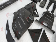 DRY CARBON BODY KIT for FERRARI PUROSANGUE 2023+ FORZA PERFORMANCE custom fit Novitec Style
Set includes:

Front Lip
Front Bumper
Hood Bonnet
Engine Cover
Front Fender Flares
Side Mirror Covers
Side Skirts
Rear Fender Flares
Roof Spoiler
Ducktail Spoiler
Rear Diffuser
Material: Dry Carbon

NOTE: Professional installation is required.