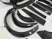 DRY CARBON BODY KIT for FERRARI PUROSANGUE 2023+ FORZA PERFORMANCE custom fit Novitec Style
Set includes:

Front Lip
Front Bumper
Hood Bonnet
Engine Cover
Front Fender Flares
Side Mirror Covers
Side Skirts
Rear Fender Flares
Roof Spoiler
Ducktail Spoiler
Rear Diffuser
Material: Dry Carbon

NOTE: Professional installation is required.