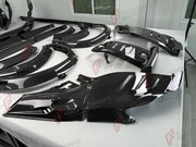 DRY CARBON BODY KIT for FERRARI PUROSANGUE 2023+ FORZA PERFORMANCE custom fit OEM Style

Set includes:
Front Bumper
Hood Bonnet
Front Fenders
Fender Flares
Side Skirts
Door Trims
Rear Bumper
Rear Diffuser

Material: Dry Carbon

NOTE: Professional installation is required.