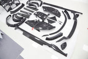 DRY CARBON BODY KIT for Ferrari Purosangue 2023+
Set includes:

Front Lip
Front Bumper
Hood Bonnet
Engine Cover
Front Fender Flares
Side Mirror Covers
Side Skirts
Rear Fender Flares
Roof Spoiler
Ducktail Spoiler
Rear Diffuser
Material
Dry Carbon
Note
Professional installation is required.