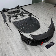 DRY CARBON BODY KIT for FERRARI ROMA 2020 - 2025 FORZA PERFORMANCE custom fit Mansory Style

Set includes:
Front Lip
Front Bumper Assembly
Hood Bonnet
Side Fender Vents
Side Mirror Covers
Side Skirts
Ducktail Spoiler
Rear Bumper Assembly
Rear Diffuser

Material: Dry Carbon

NOTE: Professional installation is required.