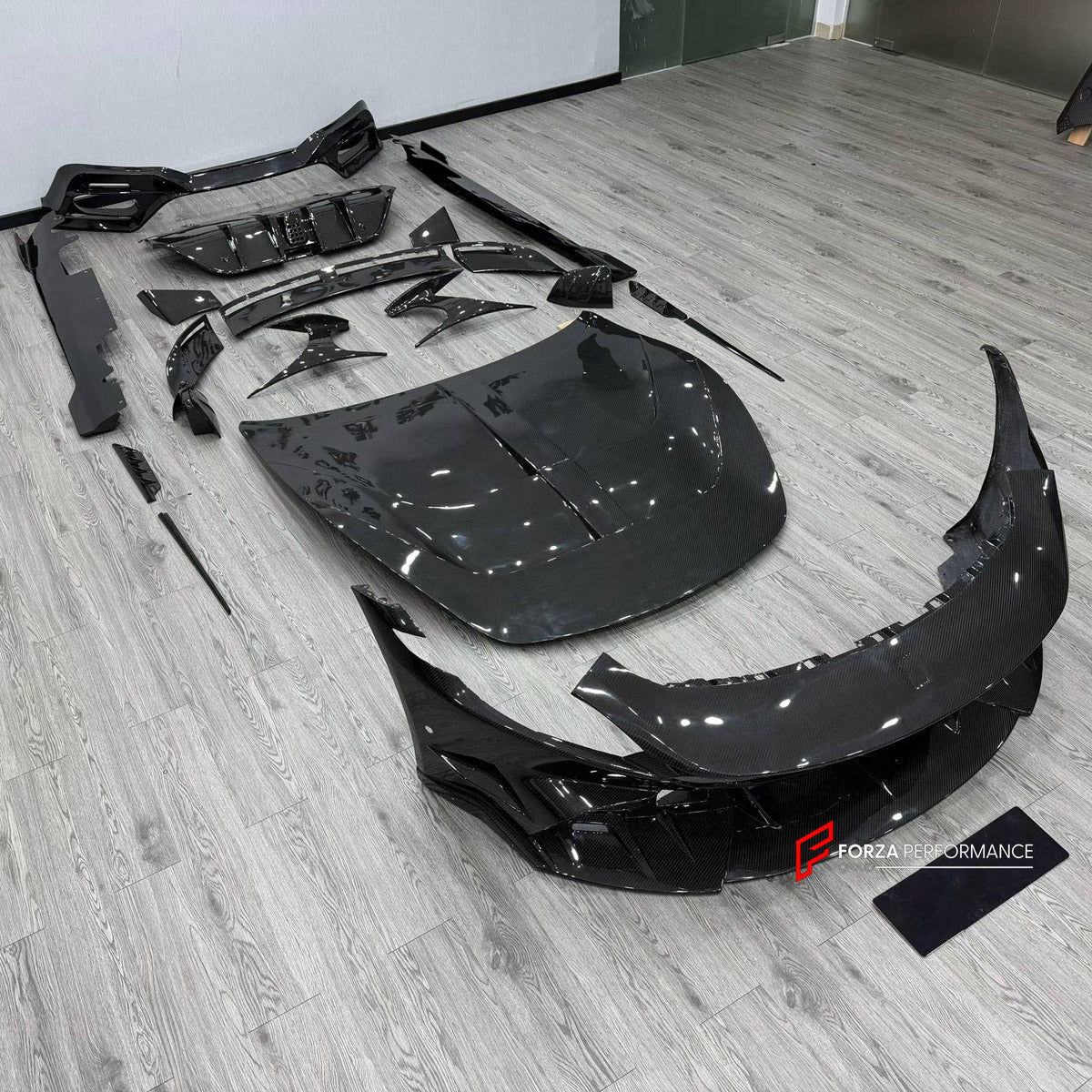DRY CARBON BODY KIT for FERRARI ROMA 2020 - 2025 FORZA PERFORMANCE custom fit Mansory Style

Set includes:
Front Lip
Front Bumper Assembly
Hood Bonnet
Side Fender Vents
Side Mirror Covers
Side Skirts
Ducktail Spoiler
Rear Bumper Assembly
Rear Diffuser

Material: Dry Carbon

NOTE: Professional installation is required.