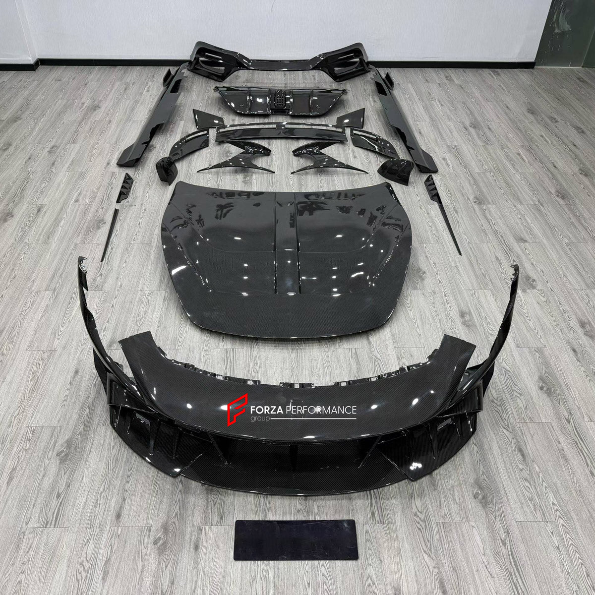 DRY CARBON BODY KIT for FERRARI ROMA 2020 - 2025 FORZA PERFORMANCE custom fit Mansory Style

Set includes:
Front Lip
Front Bumper Assembly
Hood Bonnet
Side Fender Vents
Side Mirror Covers
Side Skirts
Ducktail Spoiler
Rear Bumper Assembly
Rear Diffuser

Material: Dry Carbon

NOTE: Professional installation is required.
