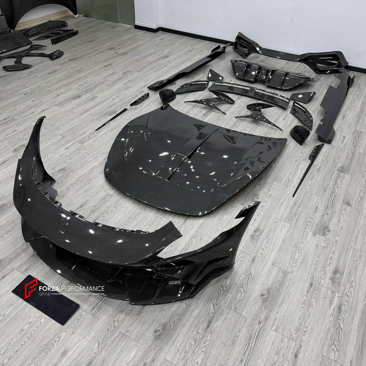 DRY CARBON BODY KIT for FERRARI ROMA 2020 - 2025 FORZA PERFORMANCE custom fit Mansory Style

Set includes:
Front Lip
Front Bumper Assembly
Hood Bonnet
Side Fender Vents
Side Mirror Covers
Side Skirts
Ducktail Spoiler
Rear Bumper Assembly
Rear Diffuser

Material: Dry Carbon

NOTE: Professional installation is required.