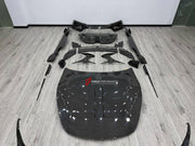 DRY CARBON BODY KIT for FERRARI ROMA 2020 - 2025 FORZA PERFORMANCE custom fit Mansory Style

Set includes:
Front Lip
Front Bumper Assembly
Hood Bonnet
Side Fender Vents
Side Mirror Covers
Side Skirts
Ducktail Spoiler
Rear Bumper Assembly
Rear Diffuser

Material: Dry Carbon

NOTE: Professional installation is required.