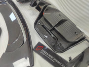 DRY CARBON BODY KIT for FERRARI SF90 2019+
Set includes:

Front Lip
Front Bumper Canards
Hood Bonnet Trim
Side Mirror Covers
Side Skirts
Rear Side Air Vents
Engine Bay Cover Lid
Rear Spoiler
Rear Diffuser
Material: Dry Carbon

NOTE: Professional installation is required.