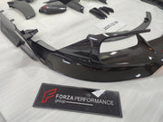 DRY CARBON BODY KIT for FERRARI SF90 2019+
Set includes:

Front Lip
Front Bumper Canards
Hood Bonnet Trim
Side Mirror Covers
Side Skirts
Rear Side Air Vents
Engine Bay Cover Lid
Rear Spoiler
Rear Diffuser
Material: Dry Carbon

NOTE: Professional installation is required.