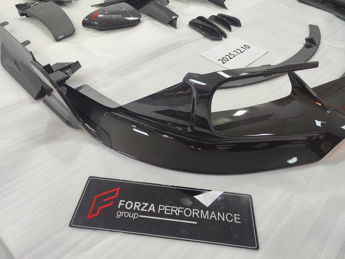 DRY CARBON BODY KIT for FERRARI SF90 2019+
Set includes:

Front Lip
Front Bumper Canards
Hood Bonnet Trim
Side Mirror Covers
Side Skirts
Rear Side Air Vents
Engine Bay Cover Lid
Rear Spoiler
Rear Diffuser
Material: Dry Carbon

NOTE: Professional installation is required.