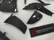 DRY CARBON BODY KIT for FERRARI SF90 2019+
Set includes:

Front Lip
Front Bumper Canards
Hood Bonnet Trim
Side Mirror Covers
Side Skirts
Rear Side Air Vents
Engine Bay Cover Lid
Rear Spoiler
Rear Diffuser
Material: Dry Carbon

NOTE: Professional installation is required.