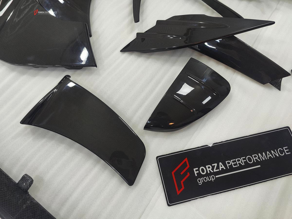 DRY CARBON BODY KIT for FERRARI SF90 2019+
Set includes:

Front Lip
Front Bumper Canards
Hood Bonnet Trim
Side Mirror Covers
Side Skirts
Rear Side Air Vents
Engine Bay Cover Lid
Rear Spoiler
Rear Diffuser
Material: Dry Carbon

NOTE: Professional installation is required.