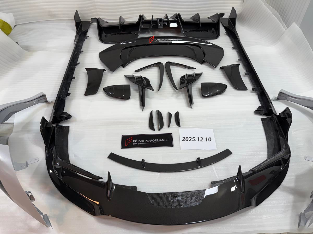 DRY CARBON BODY KIT for FERRARI SF90 2019+
Set includes:

Front Lip
Front Bumper Canards
Hood Bonnet Trim
Side Mirror Covers
Side Skirts
Rear Side Air Vents
Engine Bay Cover Lid
Rear Spoiler
Rear Diffuser
Material: Dry Carbon

NOTE: Professional installation is required.