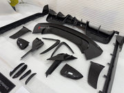 DRY CARBON BODY KIT for FERRARI SF90 2019+
Set includes:

Front Lip
Front Bumper Canards
Hood Bonnet Trim
Side Mirror Covers
Side Skirts
Rear Side Air Vents
Engine Bay Cover Lid
Rear Spoiler
Rear Diffuser
Material: Dry Carbon

NOTE: Professional installation is required.