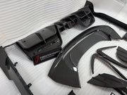 DRY CARBON BODY KIT for FERRARI SF90 2019+
Set includes:

Front Lip
Front Bumper Canards
Hood Bonnet Trim
Side Mirror Covers
Side Skirts
Rear Side Air Vents
Engine Bay Cover Lid
Rear Spoiler
Rear Diffuser
Material: Dry Carbon

NOTE: Professional installation is required.