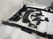DRY CARBON BODY KIT for FERRARI SF90 2019+
Set includes:

Front Lip
Front Bumper Canards
Hood Bonnet Trim
Side Mirror Covers
Side Skirts
Rear Side Air Vents
Engine Bay Cover Lid
Rear Spoiler
Rear Diffuser
Material: Dry Carbon

NOTE: Professional installation is required.
