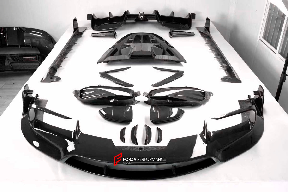 DRY CARBON BODY KIT for FERRARI SF90 2019+
Set includes:

Front Lip
Front Bumper Canards
Hood Bonnet Trim
Side Mirror Covers
Side Skirts
Rear Side Air Vents
Engine Bay Cover Lid
Rear Spoiler
Rear Diffuser
Material: Dry Carbon

NOTE: Professional installation is required.
