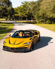 DRY CARBON BODY KIT for FERRARI SF90 2019+
Set includes:

Front Lip
Front Bumper Canards
Hood Bonnet Trim
Side Mirror Covers
Side Skirts
Rear Side Air Vents
Engine Bay Cover Lid
Rear Spoiler
Rear Diffuser
Material: Dry Carbon

NOTE: Professional installation is required.