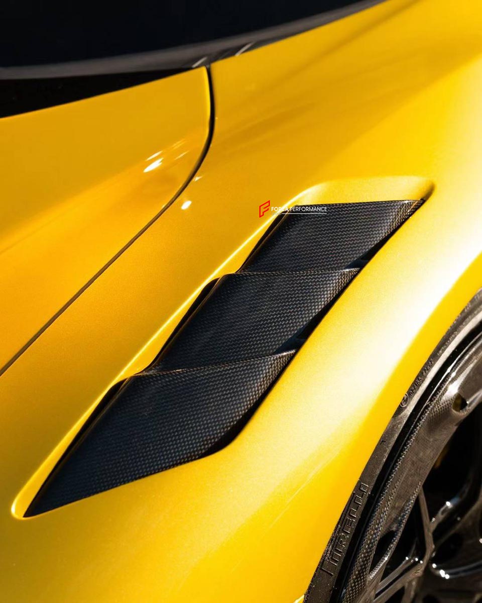 DRY CARBON BODY KIT for FERRARI SF90 2019+
Set includes:

Front Lip
Front Bumper Canards
Hood Bonnet Trim
Side Mirror Covers
Side Skirts
Rear Side Air Vents
Engine Bay Cover Lid
Rear Spoiler
Rear Diffuser
Material: Dry Carbon

NOTE: Professional installation is required.