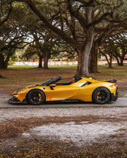 DRY CARBON BODY KIT for FERRARI SF90 2019+
Set includes:

Front Lip
Front Bumper Canards
Hood Bonnet Trim
Side Mirror Covers
Side Skirts
Rear Side Air Vents
Engine Bay Cover Lid
Rear Spoiler
Rear Diffuser
Material: Dry Carbon

NOTE: Professional installation is required.