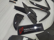 DRY CARBON BODY KIT for FERRARI SF90 2019+
Set includes:

Front Lip
Front Bumper Canards
Hood Bonnet Trim
Side Mirror Covers
Side Skirts
Rear Side Air Vents
Engine Bay Cover Lid
Rear Spoiler
Rear Diffuser
Material: Dry Carbon

NOTE: Professional installation is required.