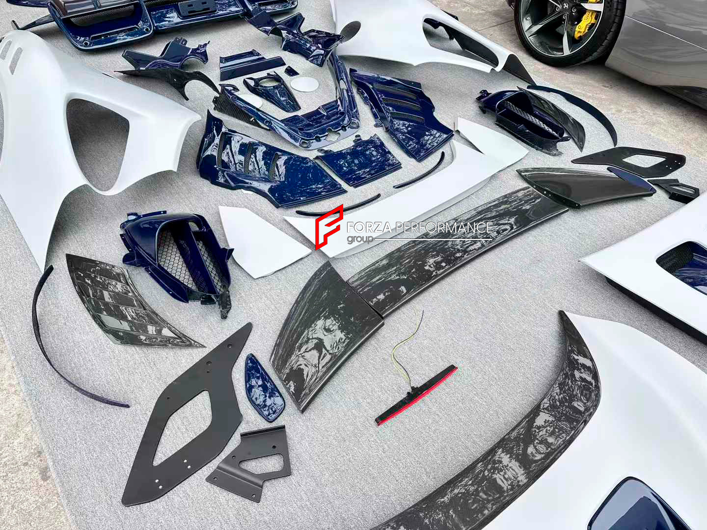 DRY CARBON BODY KIT for FERRARI SF90 2019+

Set includes:

Front Bumper Assembly
Front Bumper Canards
Front Splitter Endplates
Hood Bonnet
Front Trunk Trim
Front Fenders
Side Skirts
Quarter Panels
Side Air Vents
Engine Bay Cover Lid
Rear Wing Spoiler
Rear Bumper Assembly
Rear Diffuser

Material: Dry Carbon

Note: Professional installation is required.