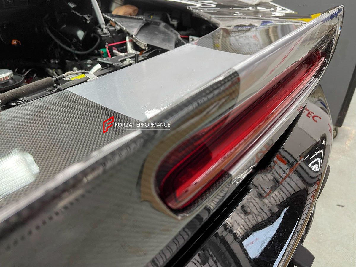 DRY CARBON BODY KIT FOR FERRARI SF90 SPIDER

Set includes: 

Lower Front Lip
Front Lip
Front Bumper Attachment
Trunk Cover
Front Lid Insert
Front Lid Cover
Front Fenders
Side Mirror Covers
Side Skirt
Side Air Inlet
Rear Lid Cover
Engine Bay
Rear Spoiler
Rear Diffuser

Material: Dry Carbon
