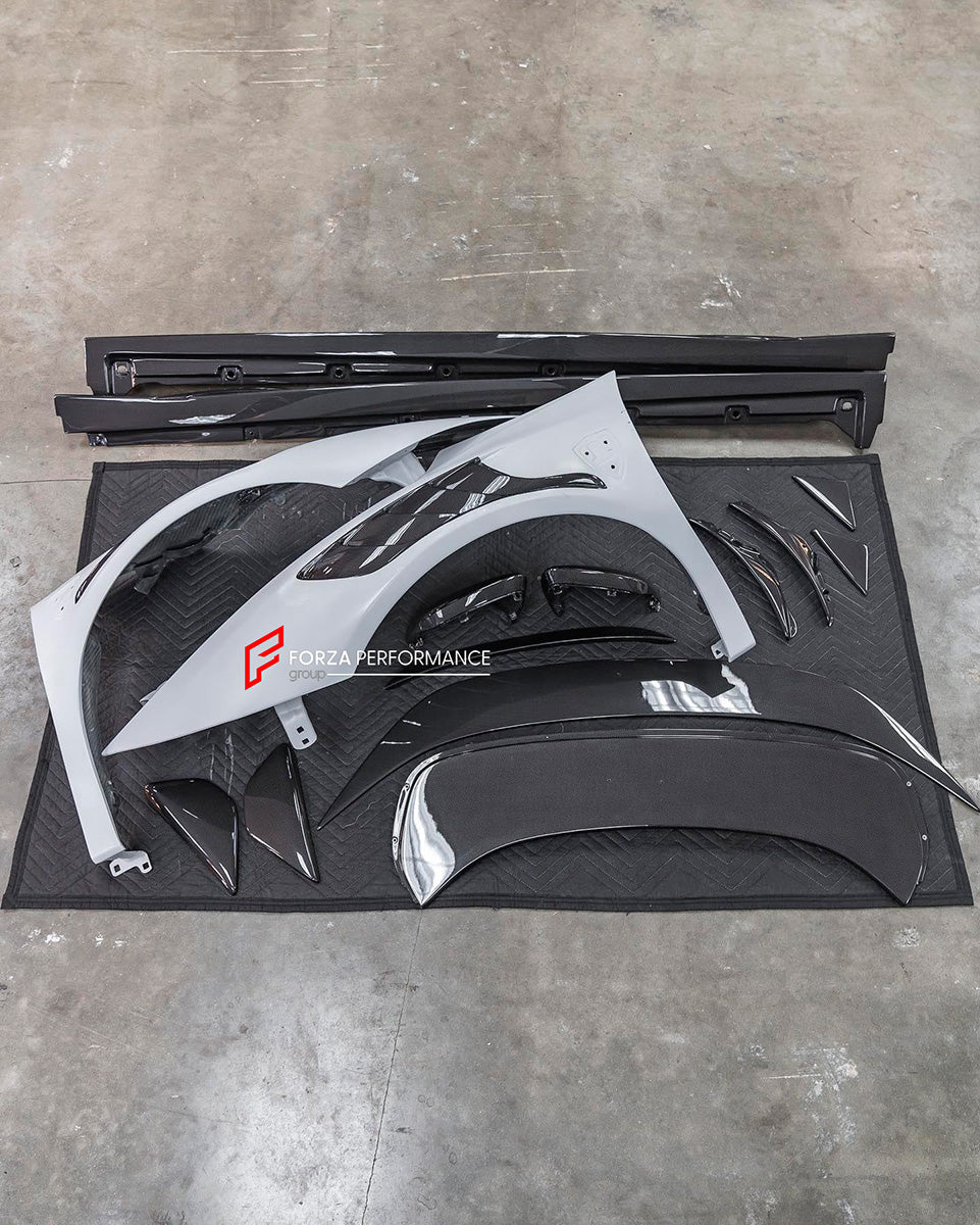 DRY CARBON BODY KIT FOR FERRARI SF90 SPIDER

Set includes: 

Lower Front Lip
Front Lip
Front Bumper Attachment
Trunk Cover
Front Lid Insert
Front Lid Cover
Front Fenders
Side Mirror Covers
Side Skirt
Side Air Inlet
Rear Lid Cover
Engine Bay
Rear Spoiler
Rear Diffuser

Material: Dry Carbon