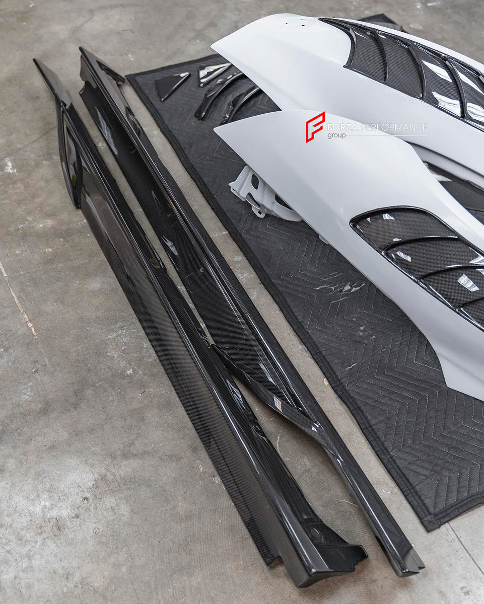 DRY CARBON BODY KIT FOR FERRARI SF90 SPIDER

Set includes: 

Lower Front Lip
Front Lip
Front Bumper Attachment
Trunk Cover
Front Lid Insert
Front Lid Cover
Front Fenders
Side Mirror Covers
Side Skirt
Side Air Inlet
Rear Lid Cover
Engine Bay
Rear Spoiler
Rear Diffuser

Material: Dry Carbon