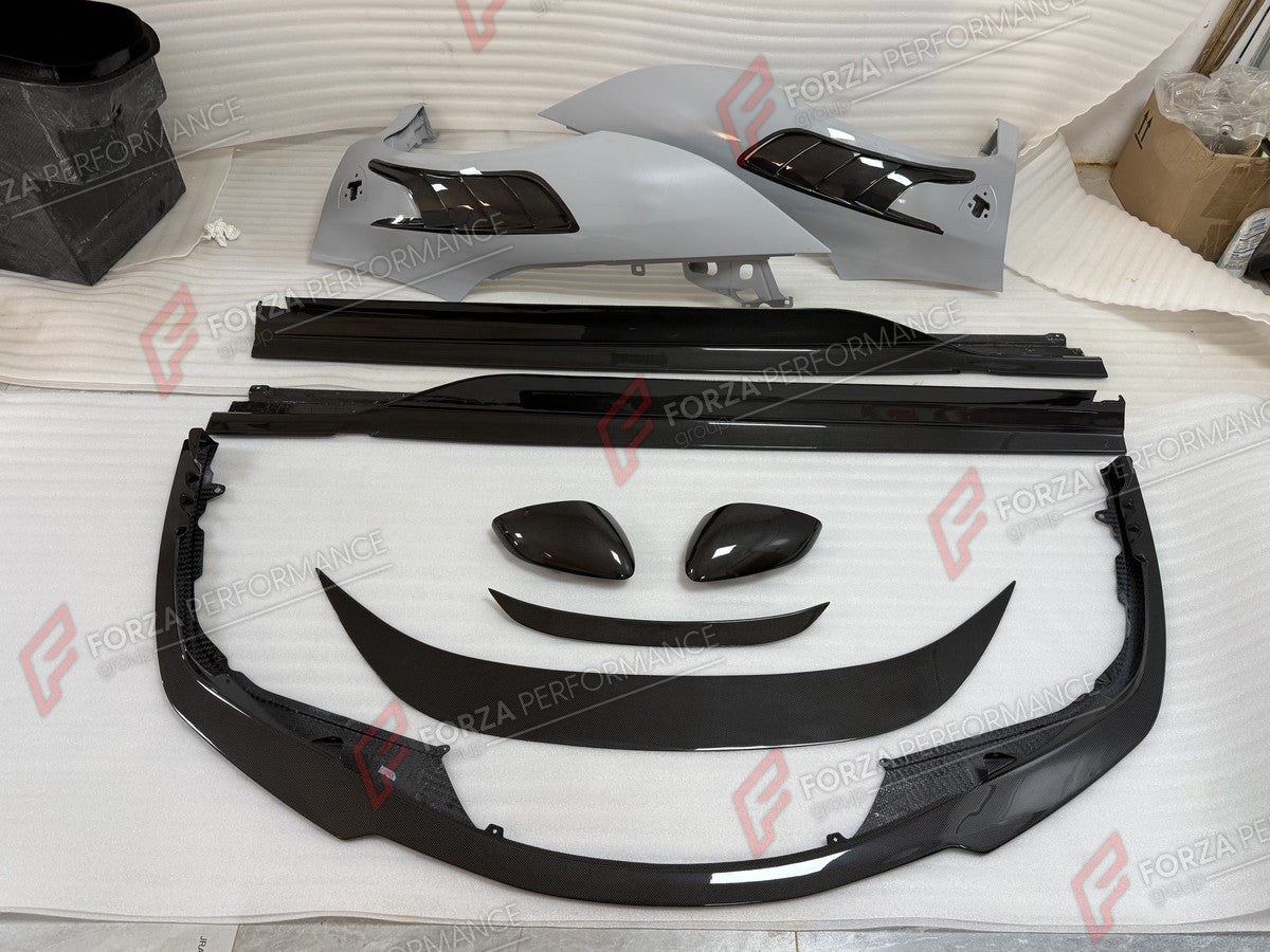 DRY CARBON BODY KIT for FERRARI SF90 STRADALE SPIDER 2019+ FORZA PERFORMANCE custom fit Novitec Style

Set includes:
Front Lip
Front Fenders with Air Vents
Side Mirror Covers
Side Skirts
Rear Spoiler Lip

Material: Dry Carbon

NOTE: Professional installation is required.