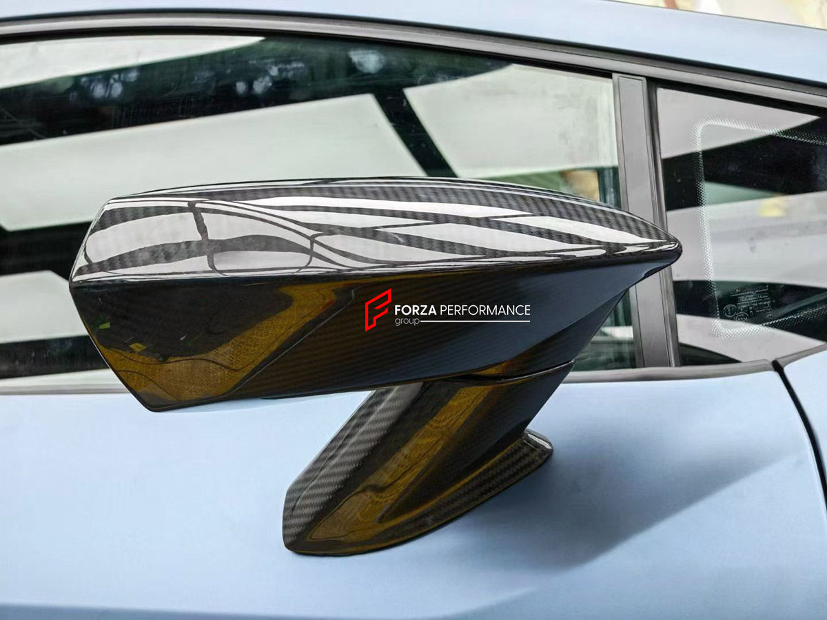 DRY CARBON BODY KIT for LAMBORGHINI HURACAN LP610-4 2014 - 2019 FORZA PERFORMANCE custom fit MAD Style

Set includes:
Front Lip Splitter
Front Bumper Canards
Side Mirror Covers
Side Skirts

Material: Dry Carbon

NOTE: Professional installation is required.