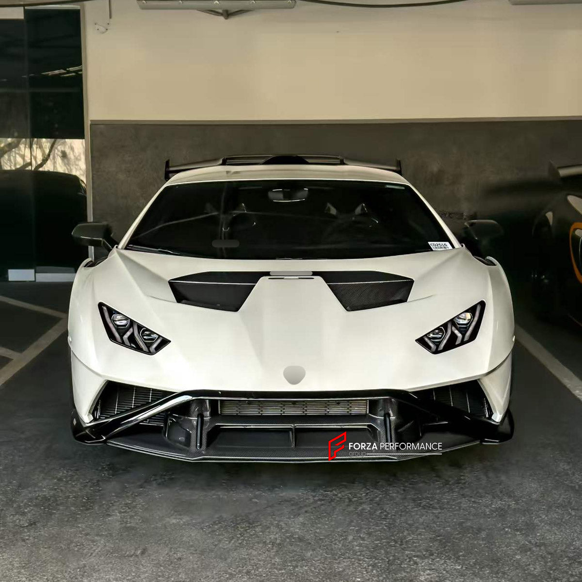DRY CARBON BODY KIT for LAMBORGHINI HURACAN STO LP640 2021 - 2024 FORZA PERFORMANCE custom fit OEM Style

Set includes:
Front Lip
Hood Bonnet Air Vents
Side Mirror Covers
Rear Spoiler Wing
Rear Diffuser

Material: Dry Carbon

NOTE: Professional installation is required.