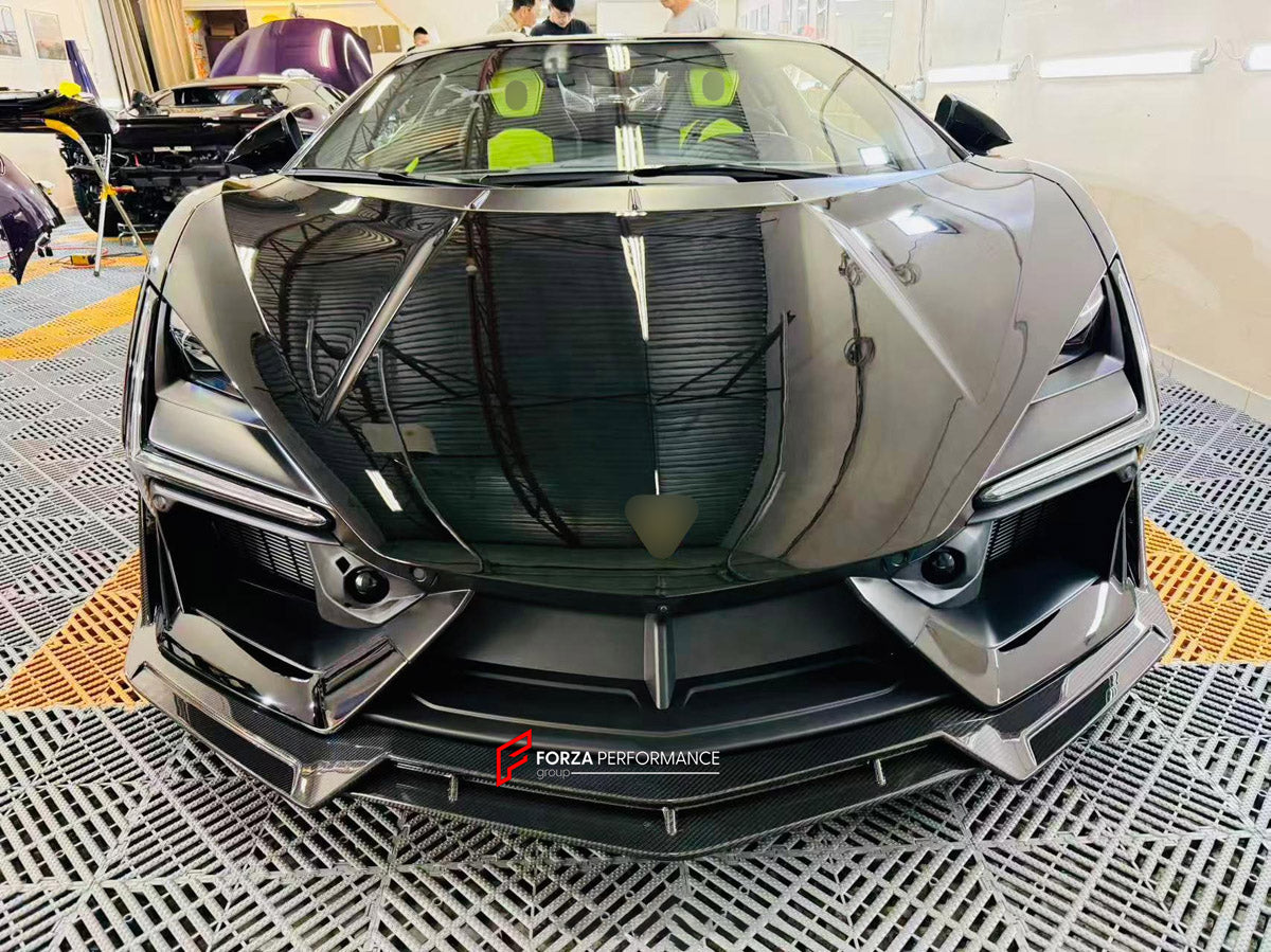 DRY CARBON BODY KIT for LAMBORGHINI REVUELTO 2023+ FORZA PERFORMANCE custom fit DK Style

Set includes:
Front Lip
Side Skirts
Rear Spoiler Wing
Engine Cover
Rear Diffuser

Material: Dry Carbon

NOTE: Professional installation is required.