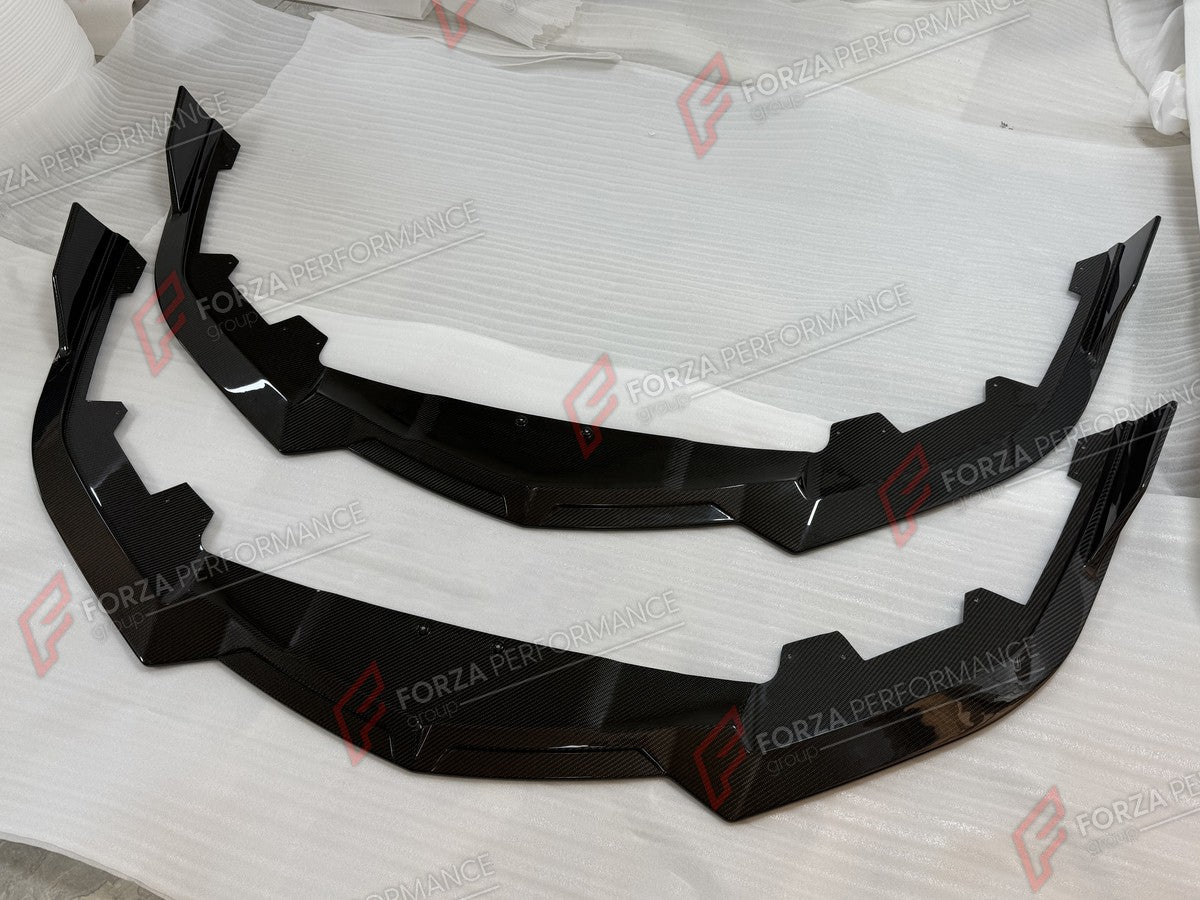 DRY CARBON BODY KIT for LAMBORGHINI REVUELTO 2023+ FORZA PERFORMANCE custom fit 1016 Industries Style

Set includes:
Front Lip
Hood Bonnet
Engine Cover
Engine Hood Air Intakes
Rear Wing Spoiler

Material: Dry Carbon

NOTE: Professional installation is required.