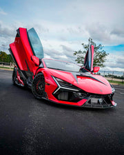 DRY CARBON BODY KIT for LAMBORGHINI REVUELTO 2023+
Set includes:

Front Lip
Middle Air Splitter for Front Bumper
Air Splitter for Front Bumper
Front Radar Cover
Headlight Covers
Hood / Bonnet
Side Skirts
Rear Spoiler
Rear Diffuser
Material: Dry Carbon

NOTE: Professional installation is required.