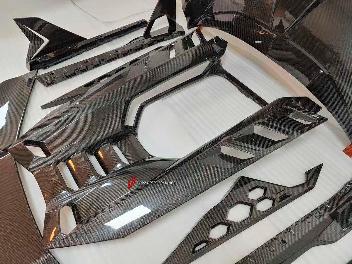 DRY CARBON BODY KIT for LAMBORGHINI REVUELTO 2023+ FORZA PERFORMANCE custom fit Duke Dynamics
Set includes:

Front Lip
Hood Bonnet
Side Skirts
Engine Cover
Rear Spoiler Wing
Rear Diffuser
Material: Dry Carbon

NOTE: Professional installation is required.