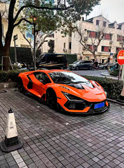 DRY CARBON BODY KIT for LAMBORGHINI REVUELTO 2023+ FORZA PERFORMANCE custom fit Duke Dynamics
Set includes:

Front Lip
Hood Bonnet
Side Skirts
Engine Cover
Rear Spoiler Wing
Rear Diffuser
Material: Dry Carbon

NOTE: Professional installation is required.