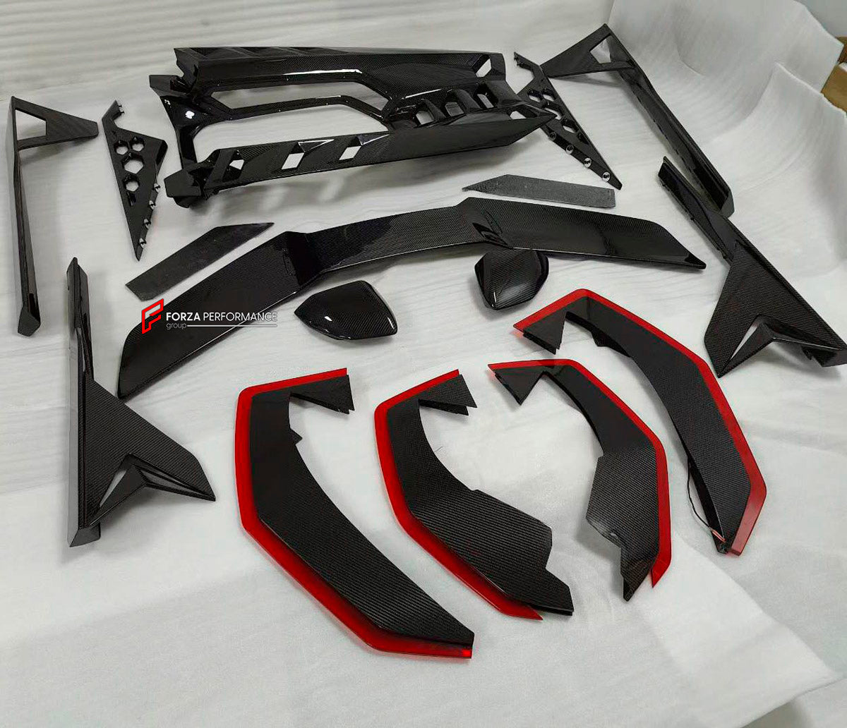 DRY CARBON BODY KIT for LAMBORGHINI REVUELTO 2023+ FORZA PERFORMANCE custom fit Duke Dynamics
Set includes:

Front Lip
Hood Bonnet
Side Skirts
Engine Cover
Rear Spoiler Wing
Rear Diffuser
Material: Dry Carbon

NOTE: Professional installation is required.