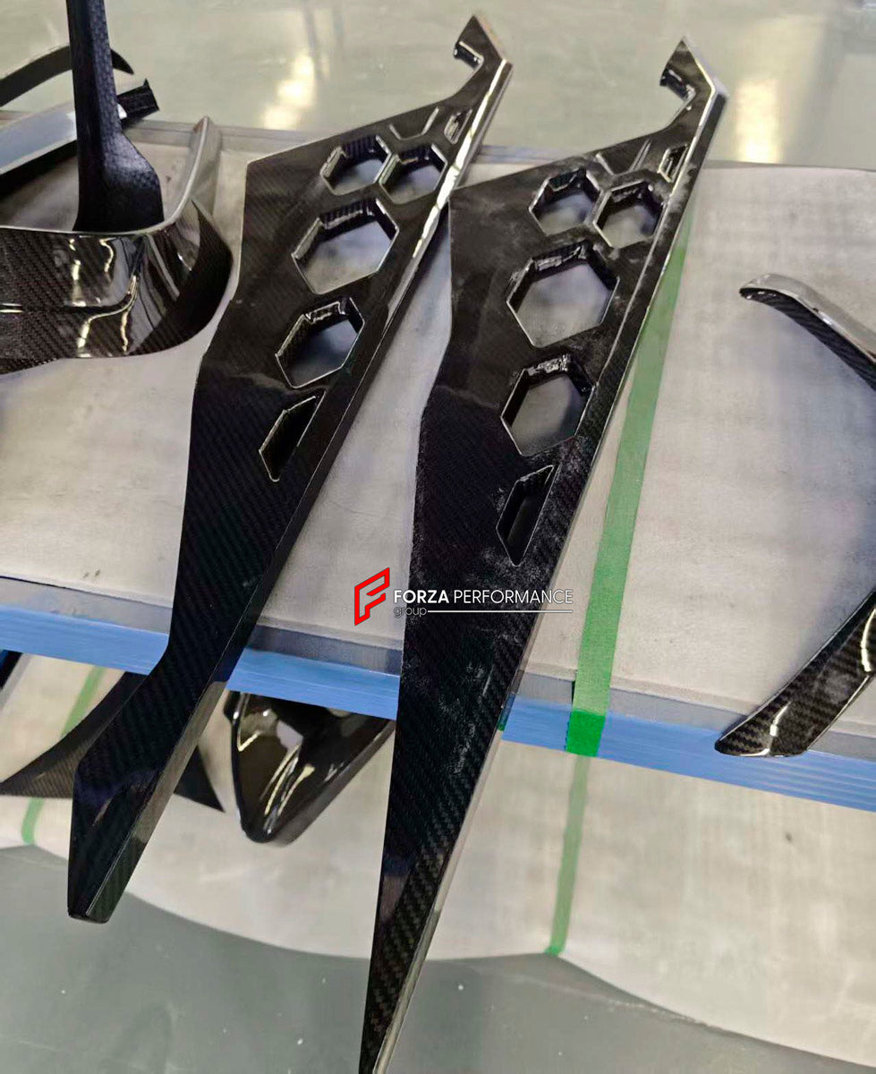 DRY CARBON BODY KIT for LAMBORGHINI REVUELTO 2023+ FORZA PERFORMANCE custom fit Duke Dynamics
Set includes:

Front Lip
Hood Bonnet
Side Skirts
Engine Cover
Rear Spoiler Wing
Rear Diffuser
Material: Dry Carbon

NOTE: Professional installation is required.