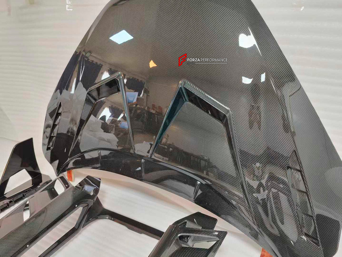 DRY CARBON BODY KIT for LAMBORGHINI REVUELTO 2023+ FORZA PERFORMANCE custom fit Duke Dynamics
Set includes:

Front Lip
Hood Bonnet
Side Skirts
Engine Cover
Rear Spoiler Wing
Rear Diffuser
Material: Dry Carbon

NOTE: Professional installation is required.