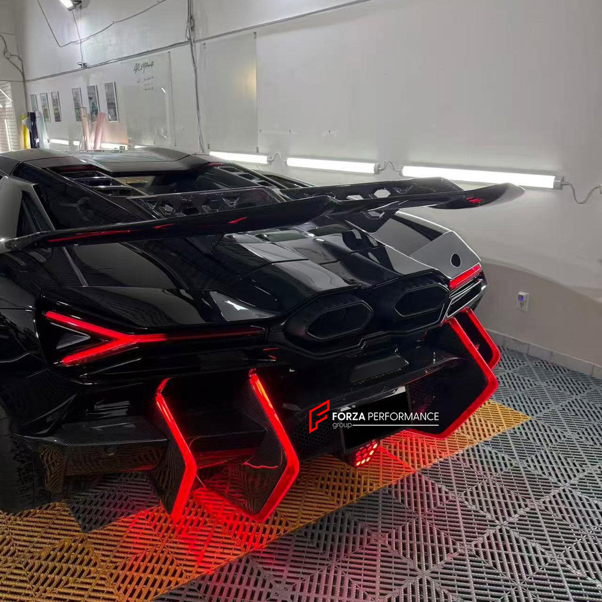 DRY CARBON BODY KIT for LAMBORGHINI REVUELTO 2023+ FORZA PERFORMANCE custom fit DK Style

Set includes:
Front Lip
Side Skirts
Rear Spoiler Wing
Engine Cover
Rear Diffuser

Material: Dry Carbon

NOTE: Professional installation is required.