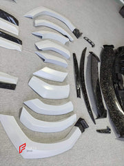 DRY CARBON BODY KIT for LAMBORGHINI URUS 2018+ FORZA PERFORMANCE custom fit Mansory Style

Set includes:
Front Lip
Front Bumper Assembly
Hood Bonnet
Front Fenders
Fender Flares
Side Mirror Covers
Side Skirts
Rear Spoiler Wing
Rear Bumper
Rear Diffuser

Material: Dry Carbon

NOTE: Professional installation is required.