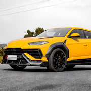 DRY CARBON BODY KIT for Lamborghini Urus S 2023+
Set includes:

Front Lip
Front Bumper Fins
Front Fenders
Front Fender Vents
Rear Fenders
Roof Spoiler
Ducktail Spoiler
Rear Diffuser
Material: Dry Carbon

NOTE: Professional installation is required.