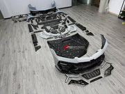 DRY CARBON BODY KIT for LAMBORGHINI URUS SE 2024+ FORZA PERFORMANCE custom fit Mansory Style

Set includes:
Front Lip
Front Bumper Assembly
Front Grille
Hood Bonnet
Fender Flares
Fenders
Side Skirts
Roof Spoiler
Ducktail Spoiler
Rear Spoiler Wing
Rear Bumper Assembly
Rear Diffuser
Exhaust System

Material: Dry Carbon

NOTE: Professional installation is required.
