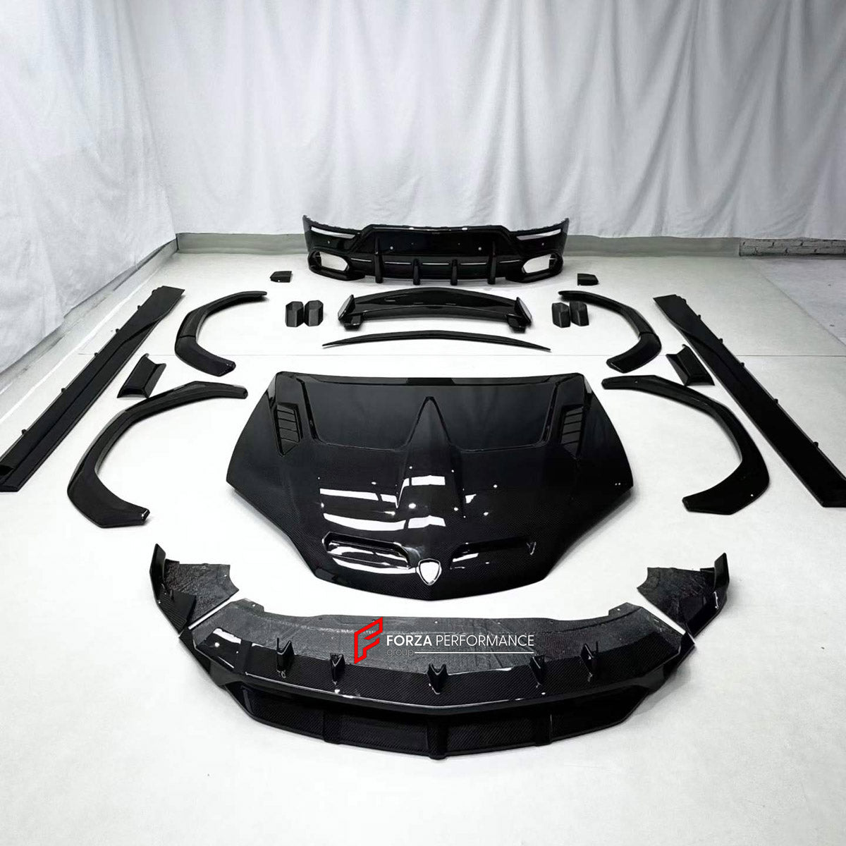 DRY CARBON BODY KIT for LAMBORGHINI URUS SE 2024+ FORZA PERFORMANCE custom fit U Style

Set includes:
Front Lip
Hood Bonnet
Fender Flares
Side Skirts
Roof Spoiler
Ducktail Spoiler
Rear Diffuser

Material: Dry Carbon

NOTE: Professional installation is required.
