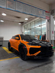 DRY CARBON BODY KIT for LAMBORGHINI URUS SE 2024+
Set includes:

Front Lip
Hood Bonnet
Fender Flares
Side Skirts
Roof Spoiler
Ducktail Spoiler
Rear Diffuser
Material: Dry Carbon

NOTE: Professional installation is required.