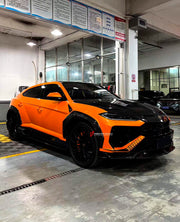 DRY CARBON BODY KIT for LAMBORGHINI URUS SE 2024+
Set includes:

Front Lip
Hood Bonnet
Fender Flares
Side Skirts
Roof Spoiler
Ducktail Spoiler
Rear Diffuser
Material: Dry Carbon

NOTE: Professional installation is required.