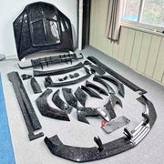 DRY CARBON BODY KIT for Lamborghini Urus SE 2024+
Set includes:

Front Lip
Hood Bonnet
Front Fenders
Front Fender Vents
Side Skirts
Rear Fenders
Roof Spoiler
Ducktail Spoiler
Rear Bumper Fins
Rear Diffuser
Material: Dry Carbon

NOTE: Professional installation is required.